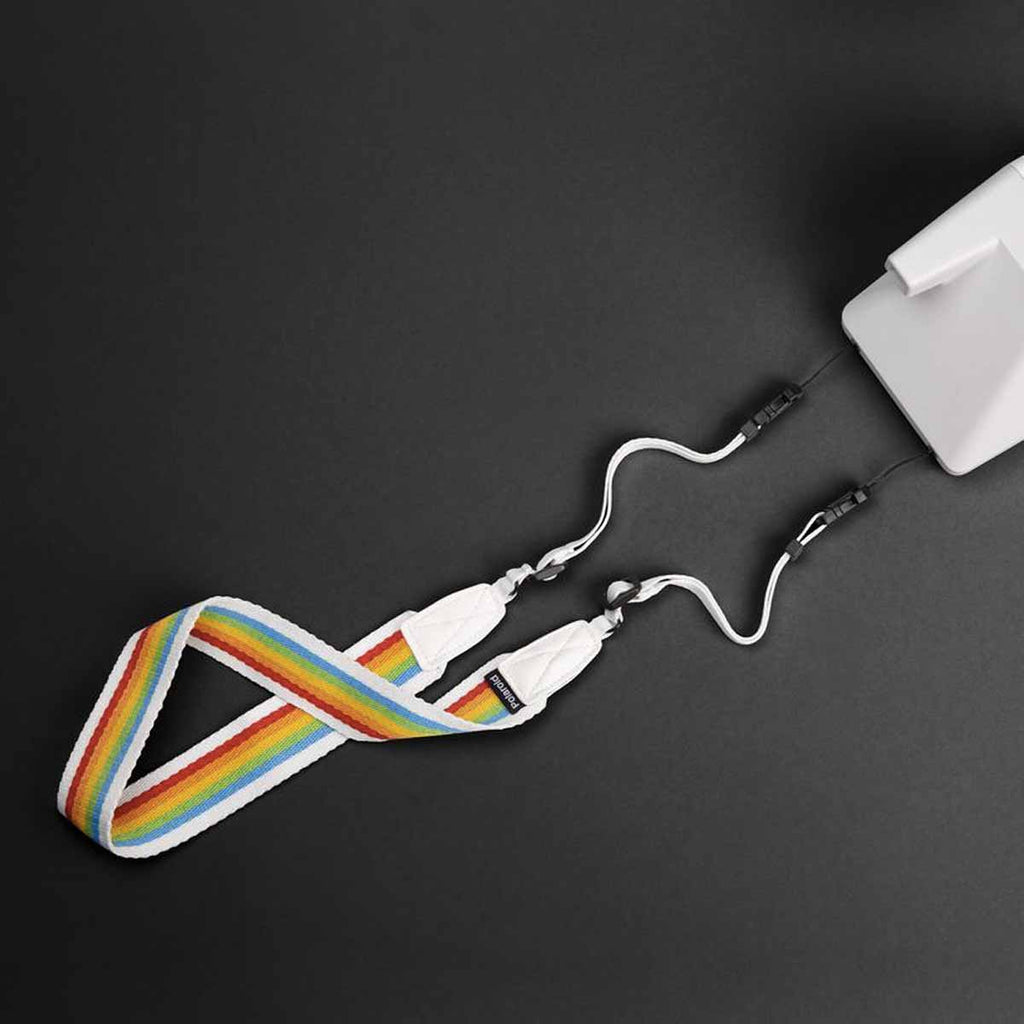 Correia plana para câmara Polaroid, branca com efeito arco-íris.